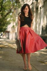Red leather midi skirt.