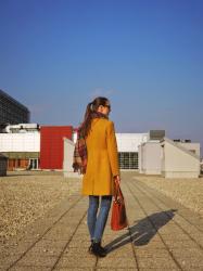 brown handbag with gold details 