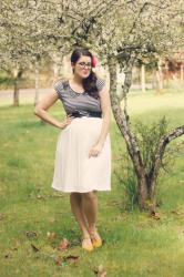 Sequined Peter Pan collar, stripes, and a pleated skirt