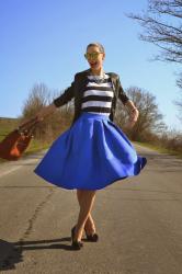 blue pleated midi skirt with rainbow stones necklace