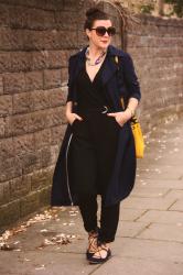 Navy trench, With a Black Jumpsuit and Pops of Yellow