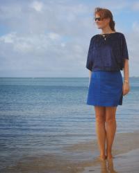 two sea change tops and a little blue skirt