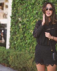 Black Lace Romper and Chuck Taylors