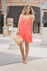 Outfit Post: Coral Ruffle Hem Dress & Cork Clutch