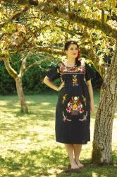 Vintage Oaxacan dress, bare feet, and flowers
