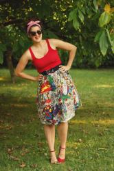 Marvel skirt, red tank top, and retro sunglasses