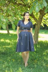 Eiffel Tower dress, t-strap wedges, and retro glasses