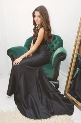 The black dress and the velvet chair