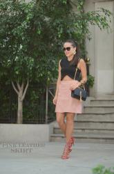 Pink leather skirt.