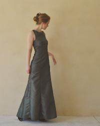 Cassie's dark moss-green ball gown