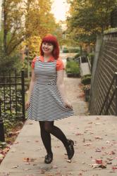 Halloween Outfit: Striped Dress over an Orange Blouse with Candy Corn Earrings