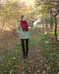 green parka with red wine scarf