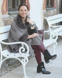 Trendy styling of an elegant faux fur cape