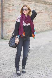 Fringed jeans and tassel scarf: ethnic chic outfit