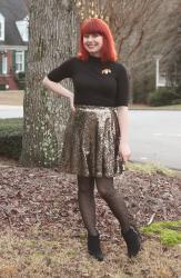 New Year's Eve Outfit: Black Turtleneck, Gold Sequined Skater Skirt, and Dotted Tights