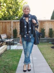 Christmas presence:  boyfriend jeans with black suede pumps, woolen scarf, and moto jacket