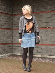 Snow day:  denim mini, sequinned sweater, Chanel-style jacket, and fierce booties!