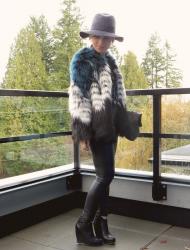 Fur baby:  faux-fur jacket with a patterned shirt, vegan leather leggings, wedge booties, and floppy hat