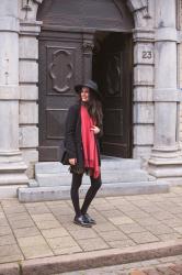 Outfit: wide brim hat, gold pleated skirt and tassel brogues