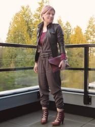 Mechanical:  jumpsuit, grommet belt, lace-up heels, and moto jacket