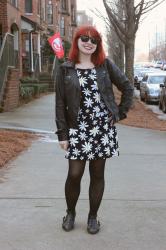 Outfit: Daisy Print Skort Romper, Black Leather Jacket, and Cutout Boots