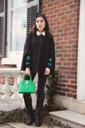 Black cape and green stripes