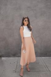 PLEATED MIDI SKIRT + BOOMERANG