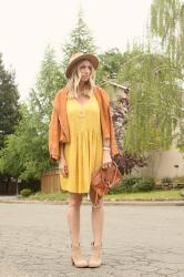 yellow pleated crepe dress