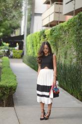 White pleated skirt.