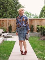 Homemaker:  acid-washed pencil skirt, floral blouse, and leopard clutch