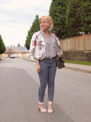 Pack attack:  printed pants, dotted blouse, floral moto jacket, and studded white sandals