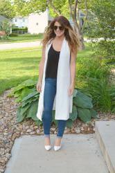 Long White Vest + White Pumps.