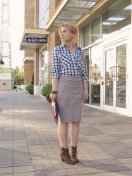 Easy does it:  plaid shirt, striped pencil skirt, and western-style booties