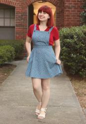Outfit: Light Blue Pinafore Dress, Red Top, and White Sandals