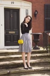 Houndstooth skirt and yellow bag