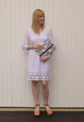 White Lace Dress and Zebra Clutch