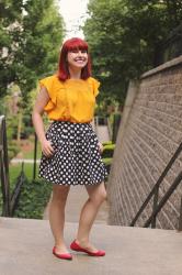 Outfit: Mustard Yellow Top, Pleated Polka Dot Skirt, and Red Flats