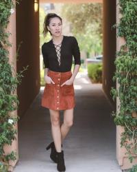 Lace Up Top Tucked into a Button Down Skirt