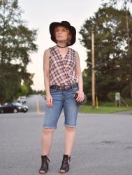 Time clock:  boyfriend shorts, plaid shirt, cut-out booties, and floppy suede hat