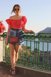 The girl in red poins top in Vietri.