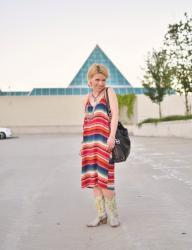 Boldly boho:  Colourful striped midi-length slipdress and cowboy boots