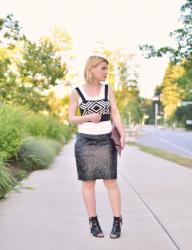 In Black and White:  textured faux-leather skirt, boyfriend tank, and graphic crop top