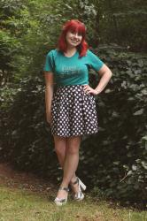 Outfit: Teal Graphic Tee, Polka Dot Pleated Skirt, and Silver Platforms