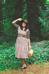 Paisley, strappy flats, and a big hat