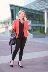 Black basics with a coral twist