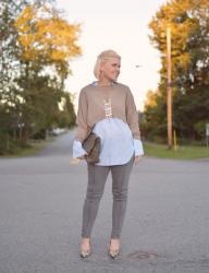 She shrugs:  How to layer an oversize-cuffed shirt under a sweater