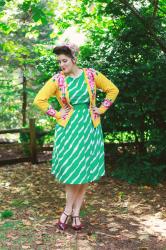 Floral cardigan, striped dress, and a headscarf