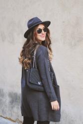 Grey cardigan, grey hat 