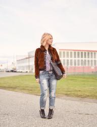 Tree topping:  Styling a faux-fur bomber with a striped tee, boyfriend jeans, and stiletto booties 