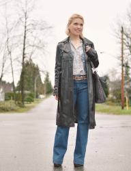 Christmas Fancy:  styling a pleather trench coat with a denim vest, patterned shirt, and flare jeans